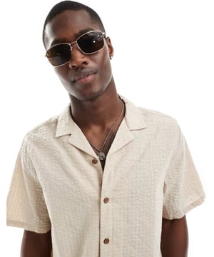 Shirts by ASOS DESIGN Part of a co-ord set Trousers sold separately Revere collar Button placket Short sleeves Oversized fitSold By: Asos