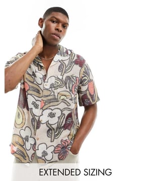 Shirts by ASOS DESIGN It?s a linen love story Floral design Revere collar Button placket Drop shoulders Relaxed fitSold By: Asos