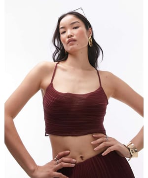 Tops by Topshop Can't top this Cowl neck Lace-up, cross-back straps Cropped length Regular fitSold By: Asos