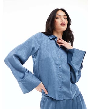 Tops by Vero Moda Part of a co-ord set Trousers sold separately Spread collar Button placket Wide cuffs Relaxed fitSold By: Asos