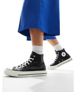 Shoes by Converse Your casualwear companions High-profile design Lace-up fastening Signature Converse All Star branding Eyelet to inner foot for ventilation Vulcanised rubber toe cap and outsole Archival rubber taping Platform soleSold By: Asos