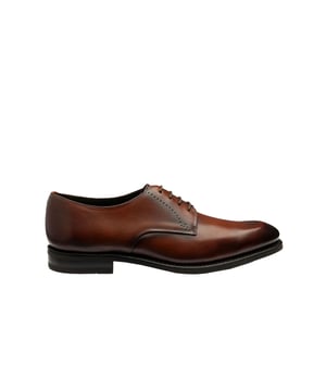 Loake Gosling Plain Derby Shoe Scotch Patina
This is a premium Calf Leather brogue, featuring Goodyear welted rubber soles for greater longevity and grip. Gosling uses the ‘edge’ last shape, and is available in a ‘f’ fitting. These are a smart shoe with a beautiful patina worked into the leather through unique hand dying. Certainly a pair to boast about! Designed and engineered in Northamptonshire, England.

100% Leather
Rubber Sole