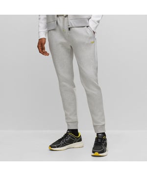 jersey broek met boord en zijband (speciale 3D-indeling met geïntegreerd logo aan één kant) - contrastbedrukt HD BOSS-logo op linker broekspijp - speciale sportieve koorduitvoering