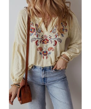 Intricate paisley floral embroidery
  Stylish notch V
  neck design
  Relaxed fit for comfort and ease of movement
  Perfect for adding a feminine flair
  Available in multiple sizes
Material: 65% Polyester 35% Cotton