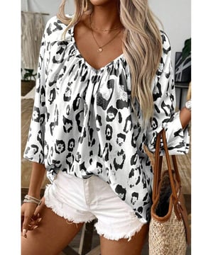 Black Leopard Print Ruched V Neck 3/4 Sleeve Blouse
  Fierce and trendy look
  Flattering V
  neckline adds a touch of sophistication
  Ruched detailing provides a stylish and textured finish
  3/4 sleeves for a versatile and chic appearance
  Suitable for both men and women
  Size chart available for a perfect fit
Material: 100% Polyester