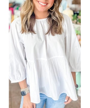 La elegante decoración de lazo añade un toque de encanto  
Diseño de espalda recortada con estilo para un look a la moda  
Corte holgado para un uso cómodo y relajado  
Mangas versátiles de 3/4 adecuadas para diversas ocasiones  
Material: 100% algodón