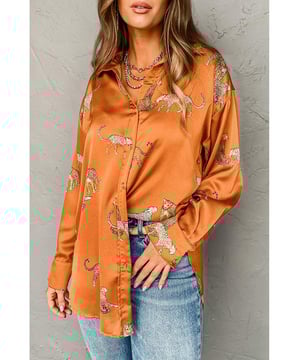 Russet Orange Cheetah Animal Print
  Button Up Satin Shirt
  Unisex
  High
  Quality Fabric
  Trendy Design
  Suitable for Casual and Formal Occasions
Material: 100% Polyester