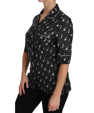 Marca: Dolce & Gabbana  
Material: 100% Seda  
Color: Negro  
Detalles del logo  
Hecho en Italia  
Exclusivo y de alta artesanía