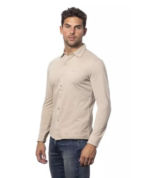 Beige Cotton Shirt
  Regular fit
  Made from Quality cotton
  Comfortable and breathable
  Classic design
  Versatile neutral beige color
  Can be dressed up or down
  Timeless addition to any stylish mans collection
Material: 100% Cotton