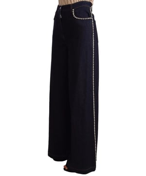 Merk: Dolce & Gabbana  
Stijl: Flared Denim  
Pasvorm: Regular  
Materiaal: 92% Katoen 6% Elasterell 2% Elastaan  
Kleur: Donkerblauw  
Sluiting: Ritssluiting  
Zakken: Vijf  
Details: Decoratieve kristallen Metaal logo plaat  
Oorsprong: Made in Italy