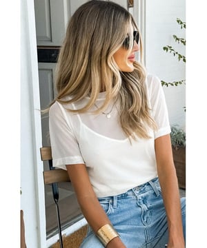Solid white color for versatile styling
  Intricate sheer mesh patchwork detailing
  Classic short sleeves for comfort
  Flattering crew neck design
  High elasticity for a comfortable fit
Material: 95% Polyamide 5% Elastane