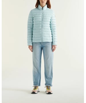 Stay stylish and warm with the Cha Down Jacket, perfect for breezy spring days with its peppermint hue and modern fit.