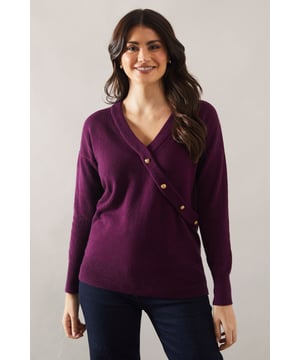 Stylish wrap design with button detail
        V-neckline for a flattering silhouette
        Long sleeves for versatile wear
        Slouchy fit offering comfort and style
        Ribbed cuffs and hem for a polished finish
    
    Embrace effortless sophistication with this button detail wrap slouchy jumper from Wallis. The wrap design, accentuated by eye-catching buttons, adds a touch of elegance to your everyday wardrobe. Its relaxed fit ensures comfort without compromising on style, making it perfect for various casual occasions. Pair it with your favourite jeans and ankle boots for a chic daytime look, or layer it over a collared shirt for a smart-casual ensemble. The versatility of this jumper shines through at family gatherings or lunch dates with friends. For a cosy yet put-together appearance, team it with wide-leg trousers and loafers. This Wallis jumper is a testament to the brand's commitment to blending comfort with glamour, ensuring you feel confident and stylish for any casual event.