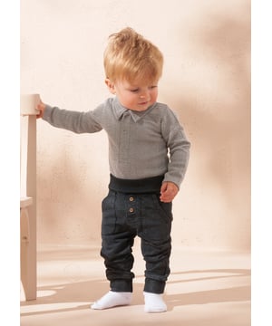 Your daily dose of cuteness! A soft and cosy baby outfit featuring a smart herringbone jersey onesie with popper placket and super soft jogger. perfect for keeping your little one comfortable and stylish.