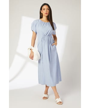 Elegant midi-length dress with drawstring waist detail
        Soft, woven fabric for comfortable all-day wear
        Versatile crew neckline and short puff sleeves
        Practical side pockets for added functionality
        Flattering silhouette suitable for various body types
    
    This charming woven dress from Principles is the epitome of effortless style for your daywear wardrobe. The drawstring waist detail allows for a customised fit, accentuating your figure while maintaining comfort. Perfect for casual events or family gatherings, this dress can be styled with flat sandals and a woven tote for a relaxed look. For a more polished ensemble, pair it with wedge espadrilles and statement earrings. The versatile design makes it ideal for various settings, from weekend brunches to afternoon garden parties. Layer with a lightweight cardigan for cooler days or wear it on its own for a breezy, summer-ready outfit. The midi length and relaxed fit ensure both style and comfort, making this dress a go-to choice for your everyday fashion needs.