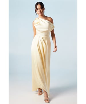 Elegant one-shoulder neckline with a graceful bow detail
        Flattering fallen shoulder design for a modern twist
        Floor-sweeping maxi length for a dramatic silhouette
        Luxurious satin fabric that drapes beautifully
        Fitted waist to accentuate your figure
    
    This stunning bridesmaids maxi dress from Coast is the epitome of sophistication and grace. Perfect for your role in the bridal party, it combines timeless elegance with contemporary flair. The one-shoulder neckline, adorned with a charming bow detail, creates a captivating focal point, while the fallen shoulder adds a touch of modern allure. The floor-length silhouette ensures a dramatic entrance, flowing gracefully as you walk down the aisle. Pair with delicate strappy heels and understated jewellery to complement the dress's refined aesthetic. For a cohesive bridal party look, coordinate with your fellow bridesmaids in matching or complementary hues, creating a stunning visual harmony that will be remembered long after the wedding bells have rung.