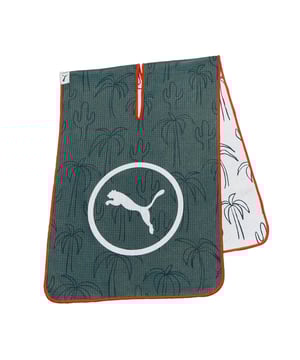 "The Puma Golf Cactus Palm Towel is the perfect accessory for golfers who want to combine functionality with style. Featuring a vibrant and unique cactus palm design, this towel adds a pop of personality to your golf bag while keeping your clubs clean and dry throughout your game. Made from high-quality materials, it's a practical and stylish tool to help maintain your equipment and elevate your golfing experience.
Key Features:
Premium Quality Material: 

Made from soft, absorbent cotton, the towel is designed to quickly dry off your clubs, hands, or golf balls, helping you maintain performance and cleanliness throughout the game.


Stylish Cactus Palm Design: 

Featuring a fun and eye-catching cactus palm print, this towel adds a playful yet stylish element to your golf accessories, ensuring it stands out in your golf bag.


Compact &amp; Convenient: 

The compact design allows for easy storage in your bag while being large enough to handle various cleaning tasks during your round.


Durable &amp; Long-Lasting: 

Made with high-quality materials, this towel is built to withstand frequent use and maintain its look and absorbency over time.


Easy Attachment: 

Equipped with a carabiner clip, the towel can be easily attached to your golf bag, ensuring itâ€™s always within reach when you need it.


Versatile Use: 

Perfect for wiping down clubs, balls, or even hands during your game, the towel is an essential accessory for golfers of all skill levels.


The Puma Golf Cactus Palm Towel is the perfect combination of practicality and style, helping you stay clean, dry, and ready for your best round of golf. Its unique design and high-quality construction make it a standout accessory for your golf set.
