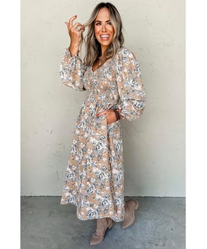 Our styles are designed with a trendy fitted look in mind following an international size standard. For the best fit we suggest choosing one size up from your usual. Be sure to check our sizing chart to find your perfect match!
  Khaki Maple Grove Floral Smocked Puff Sleeve Long Dress
  Delicate floral pattern adds a touch of romance
  Smocked bodice for a charming silhouette
  Puff sleeves for an elegant look
  Versatile style suitable for casual outings and special occasions
Material: 100% Polyester
Size on Tag: S