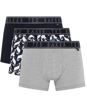 Ted Baker 3-Pack Cotton Trunks Mens Navy/Chevron/Heather GreyClothing Type: UnderwearClosure/Fastening: Pull-OnFeatures: ComfortItem Weight: 0.3 KGClothing Fit: RegularSingle Or Multi Pack?: 3 PackGift Boxed: NoMaterial Composition: 95% Cotton, 5% ElastaneUnderwear Type: TrunksUnderwear Features: Elasticated WaistbandProduct Code: TBB02-FP2-021