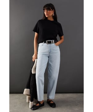 High-rise waistband for a flattering silhouette
        Barrel leg design offering a trendy, relaxed fit
        Classic five-pocket styling for practicality
        Belt loops to accommodate various belt styles
        Ankle-length cut perfect for showcasing footwear
    
    Embrace the latest denim trend with these high-rise barrel leg jeans from Warehouse. The loose fit and relaxed silhouette offer both comfort and style, making them a versatile addition to your wardrobe. Perfect for casual daywear, these jeans can be styled effortlessly for various occasions. Pair them with a cropped t-shirt and trainers for a laid-back weekend look, or dress them up with a tucked-in blouse and statement belt for family gatherings. The ankle-length cut allows you to showcase your favourite flats or low-heeled boots. For a chic ensemble, layer with an oversized blazer and accessorise with a tote bag. These jeans embody Warehouse's edgy and feminine aesthetic, ideal for the confident woman who appreciates a balance of comfort and style in her everyday attire.