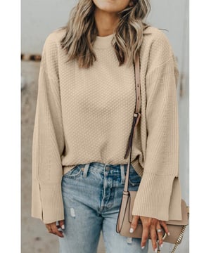 Perkament Solid Textured Knit Split Cuff Drop Shoulder Loose Sweater  
  Fijne breigoed  
  Geweven textuur, zacht en comfortabel  
  Ontwerp met relaxte doorlopende schouders  
  Losse pasvorm voor comfort en gemakkelijk laagjes creëren  
  Gespleten manchetten voor extra elegantie  
Materiaal: 50% Viscose, 28% Polyester, 22% Polyamide