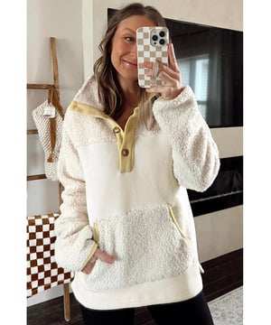 High
  quality teddy and fleece textures
  Casual fit silhouette
  Henley style buttons
  Kangaroo pocket
  Contrast trim for a pop of color
  Pairs well with fashion jeans and casual sweatpants
Material: 100% Polyester