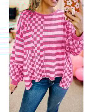 Distinctive checkerboard and striped mixed pattern
  Unique patchwork details
  Voluminous lantern sleeves for a dramatic flair
  High
  low hem and chest pocket for added detail
  Comfortable fit for casual and daily wear
Material: 100% Polyester