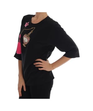Marca: Dolce & Gabbana  
Colección: Cuento de Hadas  
Color: Negro  
Motivo: Essenza di Felicita  
Cristales: Cristales champán, lentejuelas multicolores  
Cierre: Cierre trasero con botón a presión  
Detalles del logo  
Hecho en Italia  
Material: 100% Seda