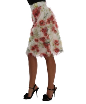 Marca: Dolce & Gabbana.
  Estilo: Falda lapiz floral.
  Cintura: Cintura alta.
  Longitud: Hasta la rodilla.
  Color: Blanco rojo multicolor.
  Cierre: Cremallera y cierre de dos botones.
  Forro: Tejido elastico de seda.
  Detalles: Detalles del logotipo.
  H.