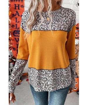 Top de Punto Waffle de Piel de Leopardo Naranja Vitalidad Unisex  
Diseño llamativo que seguramente llamará la atención  
Tejido de punto waffle suave y transpirable para una comodidad duradera  
Diseño de patchwork atrevido para quienes quieren destacar  
Estampado de leopardo audaz y elegante para hacer una declaración de moda  
Material: 95% Poliéster 5% Elastano
