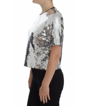 Marca: Dolce & Gabbana.
  Coleccion: SICILIA Encantada.
  Color: Negro con lentejuelas plateadas.
  Apertura con boton trasero.
  Detalles del logotipo.
  Hecho en Italia.
  Material: 100% poliester.
  Forro: 100% seda.