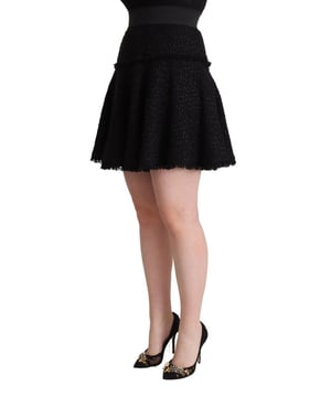 Marca: Dolce & Gabbana.
  Estilo: Mini cintura alta.
  Color: Negro.
  Cierre de cremallera y boton.
  Forro interior elastico de algodon.
  Hecho en Italia.
  Material: 34% Nylon 34% Lana Virgen 17% Algodon 8% Acrilico 7% Viscosa.
  Forro: 53% Algodon 26.