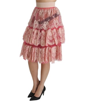 Autentica falda de encaje de cintura alta hasta la rodilla de Dolce & Gabbana.
  Diseno de encaje rosa.
  Cierre de cremallera.
  Detalles del logotipo.
  Hecho en Italia.
  Material: 74% nailon 26% algodon.
