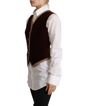 100% Authentisches Dolce & Gabbana V-Ausschnitt ärmelloses Top  
Knopfverschluss  
Hergestellt in Italien  
Bordeaux Samtfarbe  
Logo-Details  
Material: 50% Baumwolle, 30% Polyester, 10% Seide, 1% Elastan