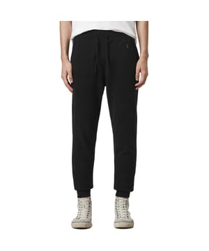 ALL SAINTS Raven Mens Slim Fit Sweatpants 
Made in India
Material: 100% Cotton
Made from super-soft cotton fabric 
Features the signature Ramskull logo to the hip in tonal stitching
Flexible waist with Adjustable Drawstring
Two slip pockets at the hips
Single slip pocket to the back 
Dropped crotch design 
Designed with a slim, tapered fit through the legs
Slim Fit
Bottom of the legs finished with elastic ties
Ribbed Waistband and Cuffs
Fleece Inside
Machine wash at 30ºC
