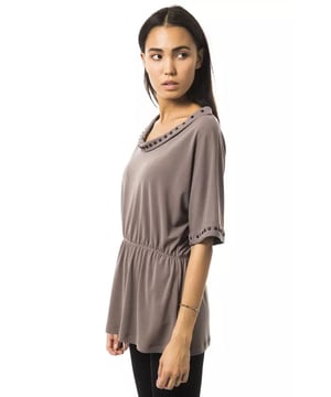 Gray Polyester Tops & T
  Shirt
  Open round neck design
  3/4 sleeves
  Made from high
  quality polyester
  Comfortable and breathable fit
  Versatile addition to your wardrobe
  Suitable for casual occasions
  Perfect for pairing with jeans or skirts
  Available for women
Material: 94% Polyester 6% Elastane