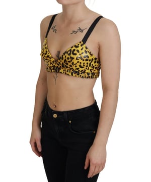 Prachtige gele luipaard gecropte bustier korsetten bh-top  
Gemaakt in Italië  
Mouwloos ontwerp met een rits aan de achterkant  
Levendig gele en zwarte luipaardprint  
Logo-details voor een vleugje luxe  
Gemaakt van een luxueuze mix van 52% polyurethaan, 43% nylon en 5% zijde  
Brandnew met labels  
Perfect voor vrouwen die een fashion statement willen maken  
Materiaal: 52% polyurethaan 43% nylon 5% zijde