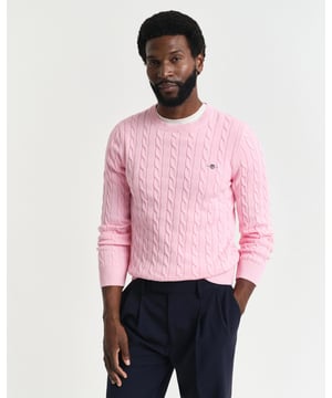 Designed in a soft cotton all-over cable knit, this sweater features our classic GANT shield embroidered at the chest, and ribbed endings at the hem and cuffs. A cable knit sweater adds a dimension of texture to your ensemble and pairs well with jeans and pants alike.
Regular fit  Crew neck  GANT graphic embroidered at chest
 
Cotton 100%
 
8050601
 
 