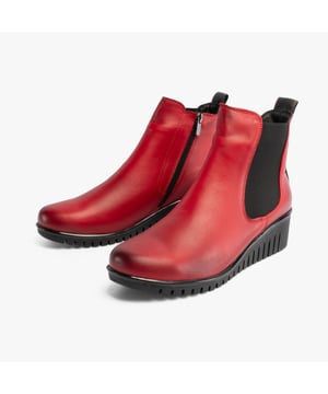 Lotus DRESDEN Womens Boots Red

  
 *   Upper Material: Leather 
 *  Lining Material: Textile 
 *  Sole Material: Rubber 
 *  Closure/Fastening: Zip 
 *  Features: Comfort,Elasticated Side Panel 
 *  Heel Type: Wedge 
 *  Toe Shape: Round 
 *  Shoe Width: Regular 
 *  Item Weight: 0 KG 
 *  Heel Height: Low (2.5-4.9cm) 
 *  Shoe Shaft Height: Ankle 
 *  Boot Style: Ankle Boots 
 *  Gift Boxed: No  Product Code: ULB382RR0