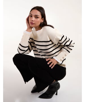 Timeless stripes and soft, cosy knit fabric make this frill neck jumper an spring time layering essential. Throw it on with flared jeans and PU black boots.