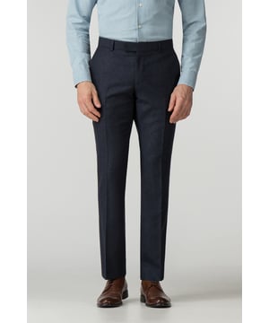 This Navy Donegal  trouser combination is made from a Wool blend and has been crafted on the Racing Green tailored block to create a refined silhouette. Wear together with a Racing Green white shirt and pair of dark jeans for a stylish off duty look or mix and match with other separates with in the range. Model is 6 ft 1 and wears a size 38R/32R.