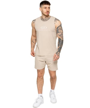 The Enzo Men's Gym Vest & Shorts Tracksuit is designed for ultimate comfort and performance. The regular-fit sleeveless vest provides a relaxed yet athletic look, with stretch material and Lycra fabric ensuring flexibility and freedom of movement. The matching gym shorts feature a regular fit and an elasticated waistband for a secure and comfortable fit. The bold Enzo Jeans branding on the chest and thigh adds a stylish, sporty touch.