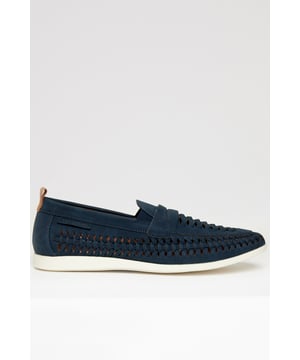 Step into effortless style with these refined woven loafers from Threadbare, crafted for both comfort and sophistication. Made from soft faux suede, these slip-on loafers feature an airy woven pattern for enhanced breathability, perfect for all-day wear. The cushioned insole provides superior comfort, while the hard rubber outer sole ensures durability and grip. Designed with a sleek, modern silhouette, these loafers pair seamlessly with both casual and smart-casual looks.