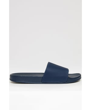 Keep it casual with these easy-to-wear slip-on sliders from Threadbare. Designed with a cushioned foam bottom for comfort, these slide sandals feature a durable rubber strap for a secure fit. Lightweight and versatile, they are perfect for warm-weather styling, whether you are poolside or out and about.