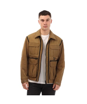 Heren BOSS Otniell Jacket in beige.- Klassieke kraag.- Volledige ritssluiting.- Vier zakken.- Gekreukt lichtgewicht nylon.- Utility details.- Relaxed fit.- 100% polyamide.- Ref: 50483888280