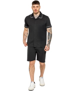 The Enzo Men's Piping Shirt & Shorts Tracksuit offers a stylish and comfortable look. The button-up shirt features a revere collar and white piping details on the collar and sleeves for a refined touch. Made from stretch fabric, it provides flexibility and a sleek fit. Paired with matching stretch shorts, this set ensures comfort and functionality with an elastic waistband, adjustable drawstring, and multiple pockets. Perfect for casual outings or lounging in style. (650&619)