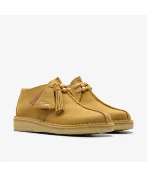 Desert Trek shoes feature a signature central butt seam, upper crafted from premium suede for durability and style. Designed with a lace-up fastening and a distinctive contrast crepe sole for all-day comfort and traction