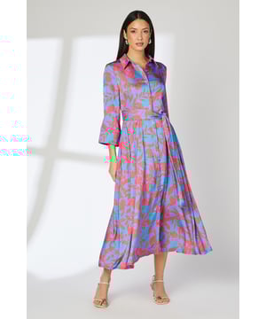 Striking floral print shirt dress with vibrant contrasting hues
        Elegant collared neckline and button-down front
        Flattering belted waist for a defined silhouette
        Three-quarter length sleeves with subtle flare
        Midi length with a graceful A-line skirt
    
    This eye-catching shirt dress from Principles is a versatile addition to your wardrobe, perfect for various daytime occasions. The satin fabric lends a luxurious sheen, while the bold floral print adds a touch of whimsy to your ensemble. Style this dress for a family gathering by pairing it with nude strappy sandals and delicate gold earrings. For a casual day out, throw on a denim jacket and white trainers for a more relaxed look. The belted waist allows you to customise the fit, accentuating your figure beautifully. Whether you're heading to a leisurely brunch or a daytime garden party, this dress will ensure you look effortlessly chic. Its machine-washable fabric makes it practical for everyday wear, allowing you to maintain its vibrancy with ease.