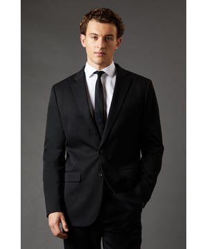 Regular fit suit jacket for a classic, comfortable silhouette
        Notched lapels for a timeless, versatile look
        Two-button front closure for easy wear
        Flap pockets at the waist for practicality and style
        Single back vent for ease of movement
    
    This Burton regular fit suit jacket is the epitome of refined British tailoring, perfect for the discerning gentleman who appreciates classic style with a modern twist. The jacket's regular fit offers a comfortable, relaxed silhouette that flatters various body types, making it an ideal choice for long days at the office or important business meetings. Pair it with matching trousers and a crisp white shirt for a complete look that exudes confidence and professionalism. For more casual affairs, such as after-work drinks or weekend gatherings at the local pub, consider teaming it with dark denim jeans and a light jumper. The versatility of this jacket allows for effortless transitions from day to night, ensuring you're always dressed to impress. Whether you're attending a wedding, giving a presentation, or enjoying a night out on the town, this Burton suit jacket is your go-to piece for looking sharp and feeling comfortable.
