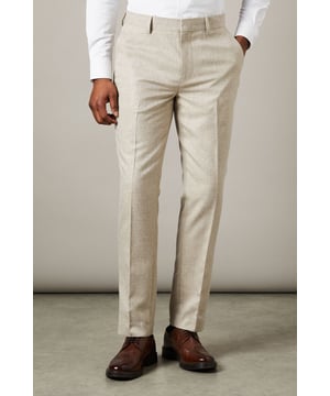 Slim fit design for a modern, tailored silhouette
        Semi-plain fabric adds subtle texture and interest
        Belt loops for versatile styling options
        Side pockets for practicality
        Pressed centre creases for a sharp, polished look
    
    These Burton slim fit suit trousers offer a contemporary take on classic tailoring. The semi-plain fabric provides a refined appearance with a touch of visual interest, perfect for the discerning gent who appreciates subtle style. The slim fit cut creates a sleek silhouette that's ideal for both office wear and smart-casual events. Pair these trousers with a crisp white shirt and brown leather brogues for a sophisticated look that transitions seamlessly from boardroom to bar. For a more relaxed ensemble, team with a light knit jumper and smart trainers. The versatility of these trousers makes them a wardrobe essential for the modern man who values both style and practicality in his attire.
